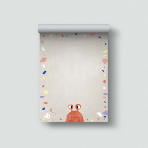 Pode incluir: Um download digital imprimível com um monstro fofo com olhos grandes e uma borda de confete colorida. O monstro é laranja e vermelho em um fundo branco.