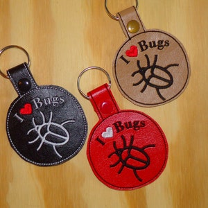 I love bugs embroidered vinyl key fobs/ key chain. Bugs, insects, beetles.