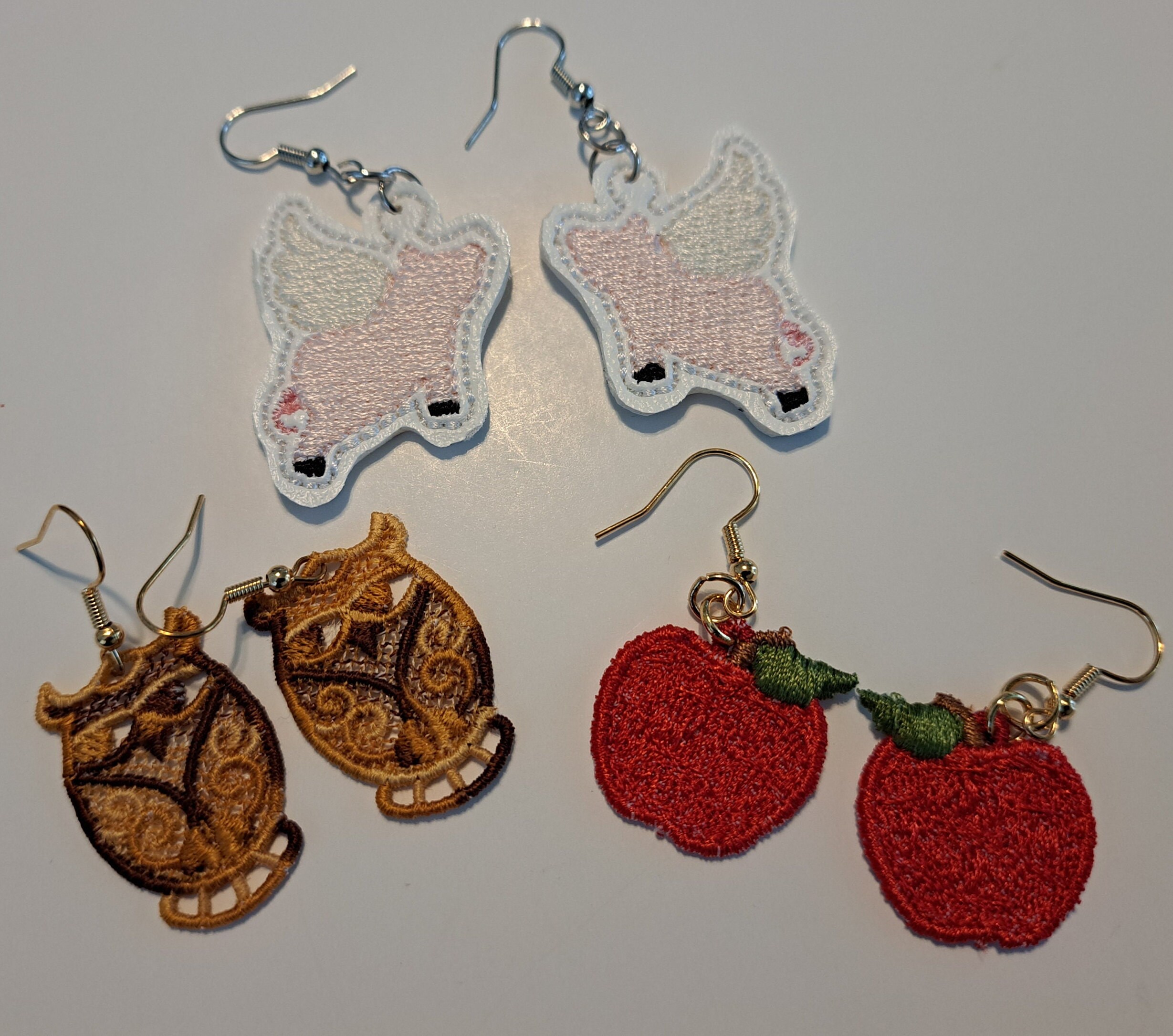 Apples or Owls embroidered free standing lace or embroidered marine vinyl Flying pig earrings!  Nick