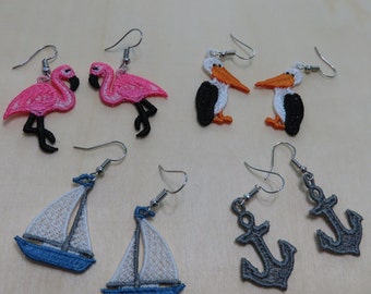 Earrings made with freestanding lace embroidery.   Flamingo, Pelican, Anchor or Sailboat.  Nickle free wires! Summer travels & vacations!