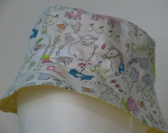 Fun, colorful reversible Bucket Hats for the whole family!  Baby farm animals with yellow, Sun hat, summer hat, beach hat