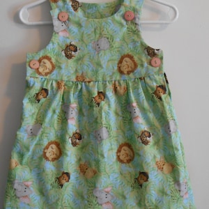 Adorable  Jungle animal print toddler, girls jumper/ sun dress, sizes NB (1-3 months)  Soft, comfortable cotton.  Toddler, baby, infants