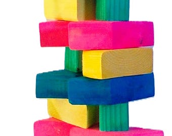 May include: A colorful wooden toy for birds, featuring a chain for hanging. The toy is made of stacked blocks in various colors, including yellow, green, blue, and pink.