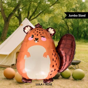 May include: A jumbo-sized, cartoon squirrel-shaped balloon in shades of orange, brown, and burgundy. The squirrel is winking and has a white belly. The balloon is in a grassy outdoor setting with a tent and the text "LULA + ROSE".