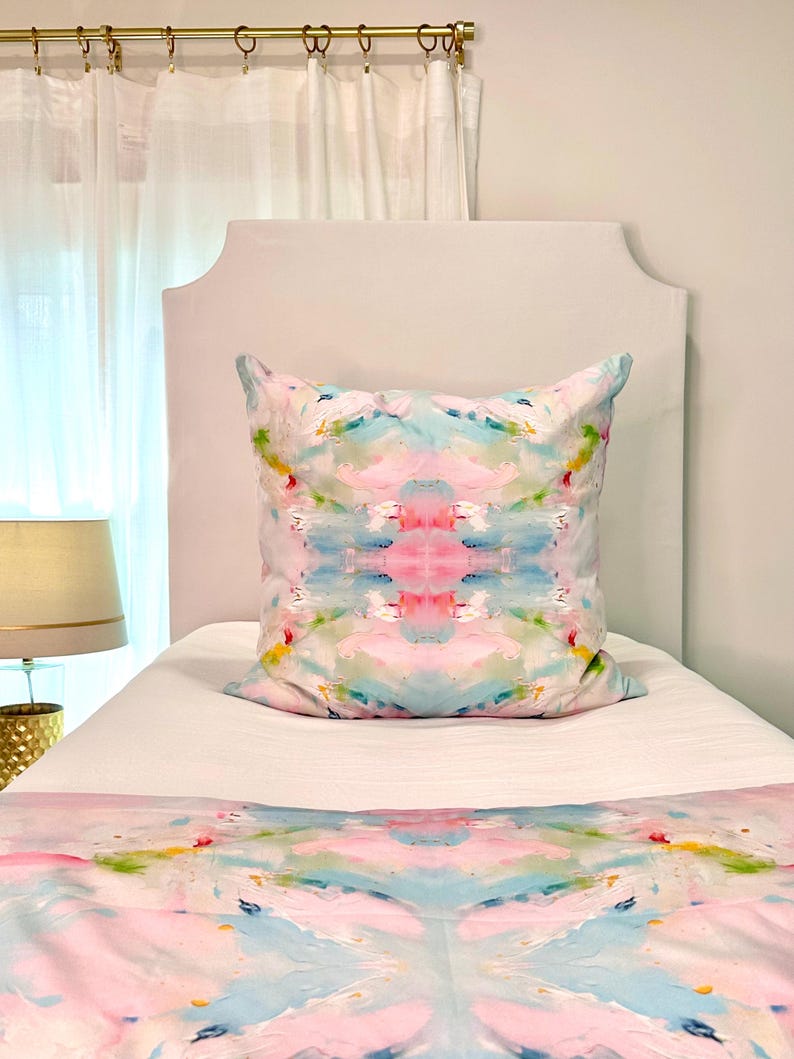 Pillow and duvet on twin bed.