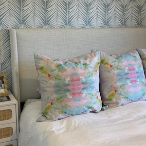 Blue, Green & Pink Pagoda Pillows in a customer’s bedroom.