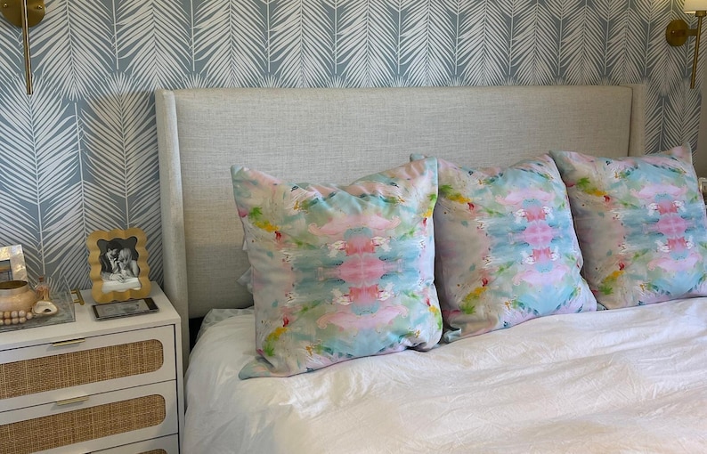 Blue, Green & Pink Pagoda Pillows in a customer’s bedroom.