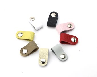 Piccola fascetta in pelle per cuffie. Pratiche fascette. Portacavi. Organizzatori per cavi.