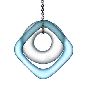 May include: A white ring with a light blue square ring around it, hanging from a silver chain.