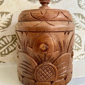 Carved indonesian wooden jar or container with lid