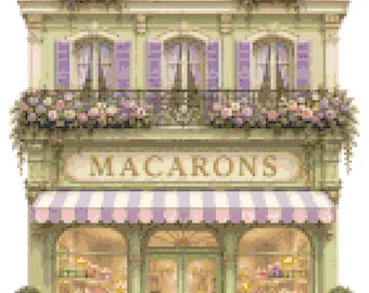 May include: A pixel art illustration of a two-story shop with a light green facade and a striped purple and white awning. The word MACARONS is printed in capital letters above the storefront. The building features purple shutters and flower boxes.