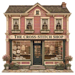 Puede incluir: Un edificio de dos plantas con revestimiento rosa y tejado oscuro, que presenta un escaparate con el texto THE CROSS-STITCH SHOP. La fachada incluye cuatro ventanas superiores con cortinas blancas, una puerta central oscura.