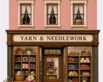 May include: A pixel art illustration of a storefront with a pink brick facade and three windows with white curtains. The dark brown sign above the display windows reads YARN & NEEDLEWORK. The shop features shelves filled with colorful yarn balls.