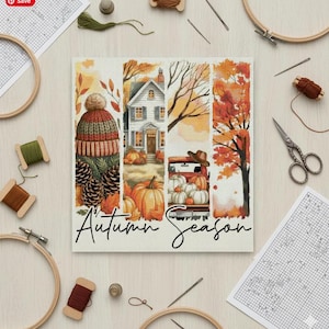 May include: A cross-stitch design with an autumn theme. The design features a knit hat, a house, pumpkins, and a truck filled with pumpkins. The words "Autumn Season" are written in cursive. The image is surrounded by embroidery supplies.