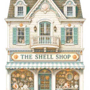 May include: A pixel art illustration of a two-story building with a cream-colored facade, teal shutters, and a striped awning. The storefront sign reads THE SHELL SHOP, and the display windows are filled with various seashells and decorative items.