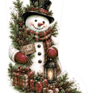 May include: A white Christmas stocking featuring a cross-stitch design of a snowman wearing a black top hat and a plaid scarf. The snowman holds a sign that reads Let It Snow, a lantern, and pine branches. Wrapped gifts sit at the base.