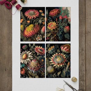 May include: A floral cross-stitch design featuring four panels of colorful flowers against a dark background. The flowers are in shades of red, yellow, and orange. Embroidery floss, scissors, and a thimble are also present.