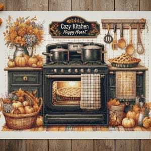Könnte beinhalten: Eine gemütliche Küchenszene mit einem schwarzen Herd, Töpfen und einem Kuchen im Ofen. Kürbisse, Blumen und ein Korb verstärken das Herbstthema. Das Schild lautet "Cozy Kitchen Happy Heart".