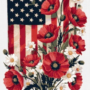 May include: Cross-stitch pattern featuring an American flag design with red poppies and white daisies. The pattern is labeled "Patriotic Floral" and measures 13.3 x 18.4 inches.
