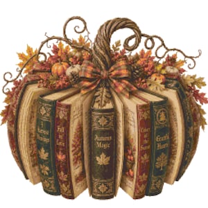 May include: A decorative pumpkin sculpture constructed from arranged books with spines titled Autumn Magic, Fall in Love, and Harvest Blessings. The top features a curved stem, a plaid ribbon bow, and an arrangement of orange and red autumn leaves.