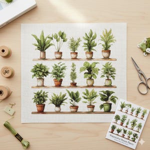 Pode incluir: Projeto de ponto cruz com plantas de casa em aquarela em prateleiras. O design inclui várias plantas em vasos em tons de verde e marrom. A imagem também mostra carretéis de linha, tesouras e um guia de padrões rotulado como "Watercolor House Plants."