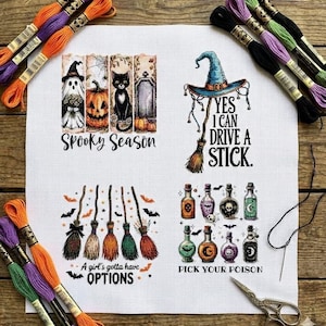 May include: A cross-stitch project with Halloween designs. The designs include a ghost, pumpkin, black cat, witch hat, broom, and potion bottles. Text includes "Spooky Season", "Yes I can drive a stick", "A girl's gotta have options", and "Pick your poison".