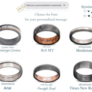 May include: Six different wedding bands with various materials and engravings. The bands are made of carbon fiber, wood, titanium, Damascus steel, 14k rose gold, and zirconium. Each band has a different font style and inscription. The fonts are Monotype Corsiva, Bell MT, Bookman, Arial, Freestyle Script, and Times New Roman.