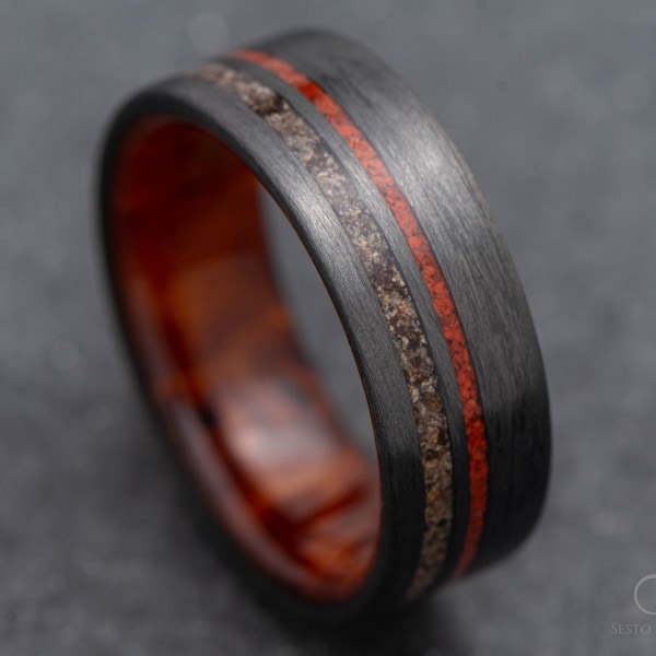 The Innovator | FREE ENGRAVING | Carbon Fiber Ring with Crushed T-Rex and Red Jasper Inlays and Thuya Wood Inner Sleeve | 7mm | Wedding Ring