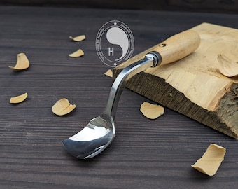 Forged curved gouge. Wood carving tools. Forged chisel.