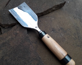 Forged chisel. Chisel for working with a mallet. Wood carving tool.