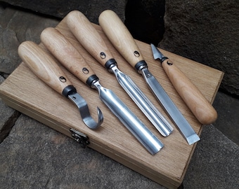 A set of forged tools for woodcarving.