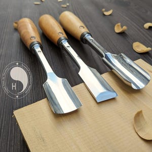 Hand forged tool set. set of tools for wood carving.