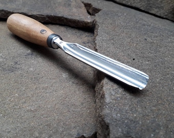 Forged gouge chisel. Woodcarving tool.