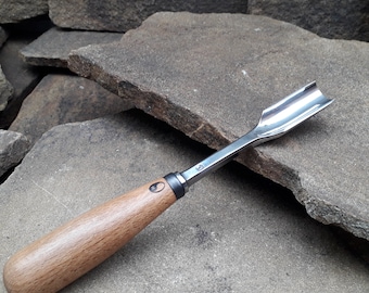 Forged gouge chisel. Wood carving tool.