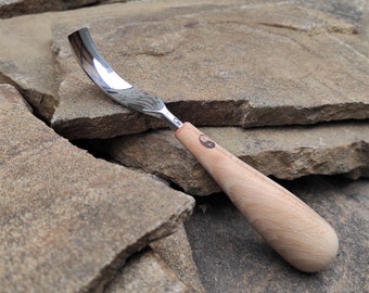 Forged compact gouge. Curved gouge. Chisel for woodcarving.