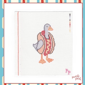 May include: A white cross-stitch fabric featuring a central design of a grey goose wearing a hot dog bun costume with a yellow mustard squiggle. The design includes a red vertical border line, a colour key on the right, and the text Purl & Point.