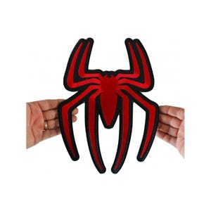 May include: Red and black embroidered iron-on patch of a spider with eight legs.