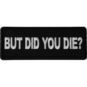 May include: Black embroidered patch with white text that reads "BUT DID YOU DIE?"