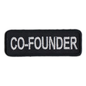 May include: Black rectangular patch with white embroidered text that reads "CO-FOUNDER".