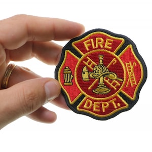 May include: Red and black embroidered fire department patch with a gold firefighter helmet, axe, hose, and hydrant. The patch is shaped like a Maltese cross and says "FIRE DEPT."