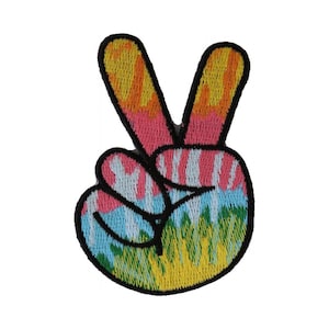 May include: A colorful peace sign patch with a tie-dye design in shades of yellow, orange, pink, blue, and green.