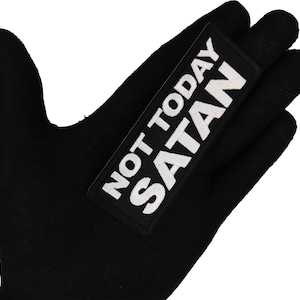 May include: Black fabric patch with white text that reads "Not Today Satan".