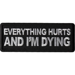 May include: Black embroidered patch with white text that reads "Everything Hurts And I'm Dying."