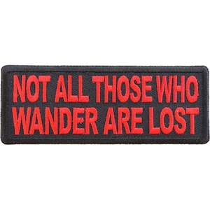 May include: Black embroidered patch with red text that reads "Not all those who wander are lost."