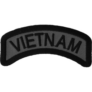May include: A black and gray embroidered patch with the word "VIETNAM" in black lettering.