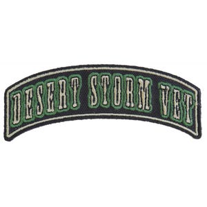May include: Black and green embroidered patch with the text "DESERT STORM VET" in white.