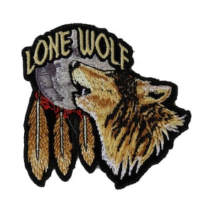 May include: Embroidered patch featuring a wolf howling at a dreamcatcher with the text "Lone Wolf" in beige lettering.