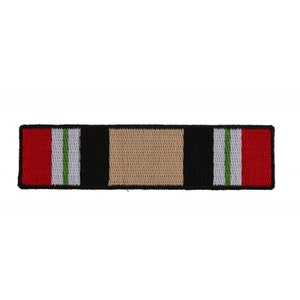 May include: A red, white, and green ribbon with a tan and black stripe in the center. The ribbon is embroidered with a black outline.