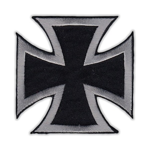 May include: A black iron cross patch with a silver outline. The patch is embroidered and has a textured look.