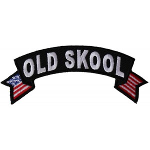May include: Black and white embroidered patch with the text "OLD SKOOL" in a banner shape with American flags on each end.